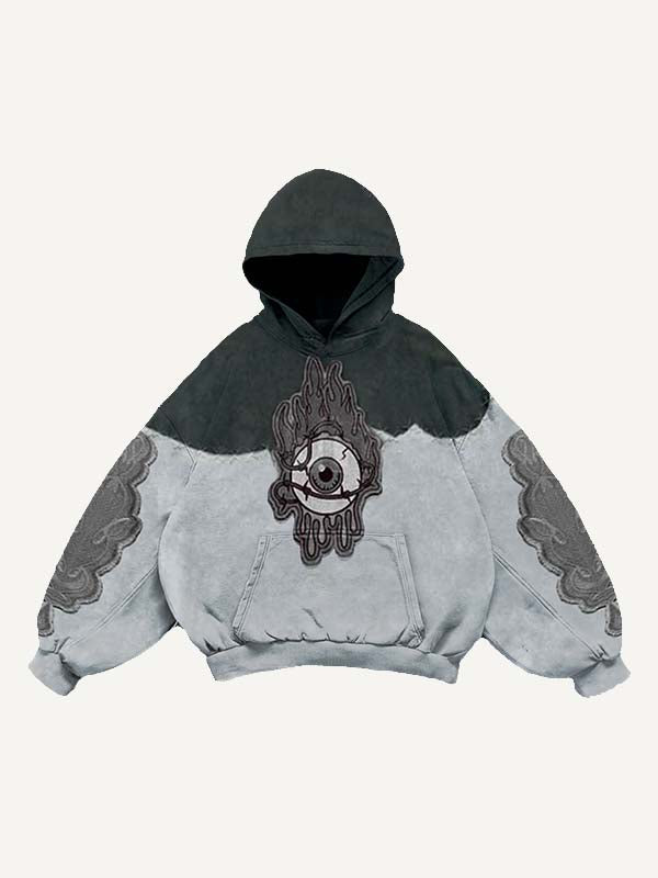 Sudadera con capucha y bolsillos inclinados con estampado de calcomanías falsas de ojos en bloques de color 