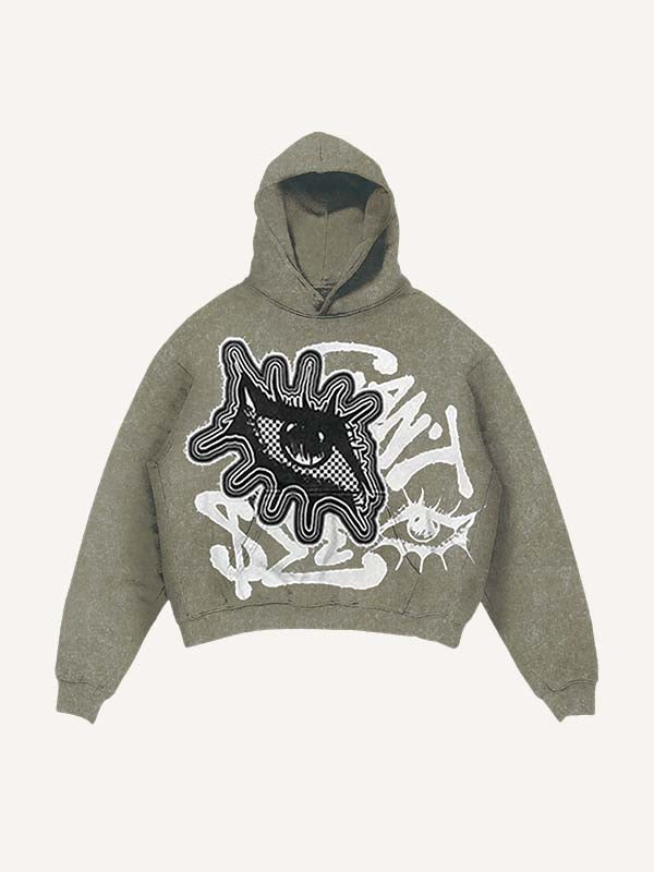 Sudadera con capucha y bolsillos inclinados con estampado de calcomanías falsas de ojos y letras desgastadas 