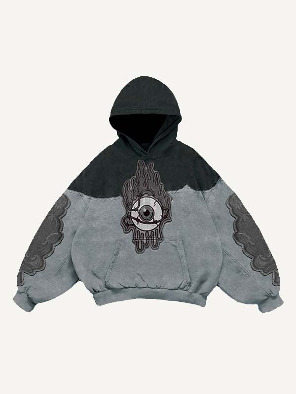 Sudadera con capucha y bolsillos inclinados con estampado de calcomanías falsas de ojos en bloques de color 