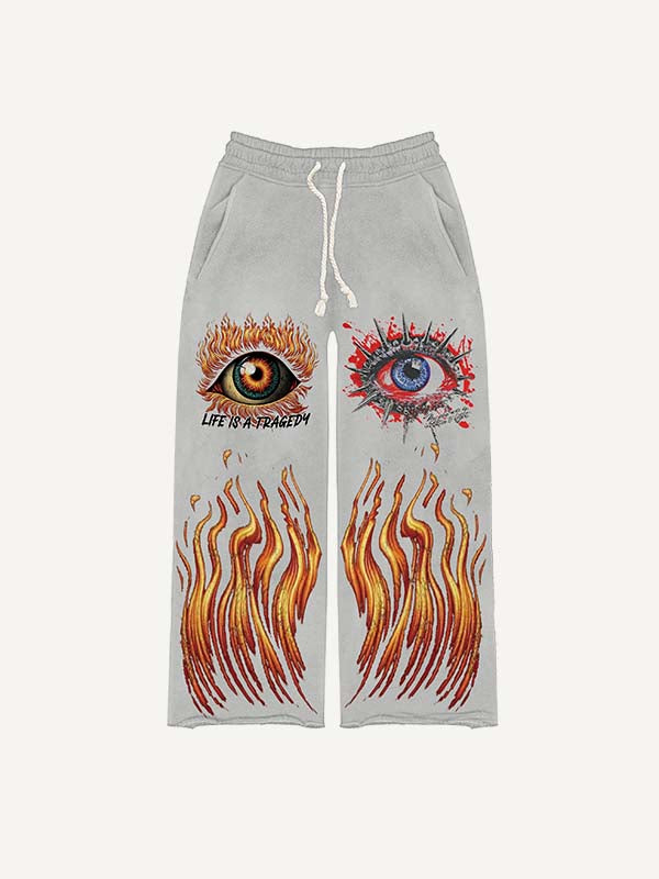 Pantalones con cintura elástica y estampado gráfico de ojos 