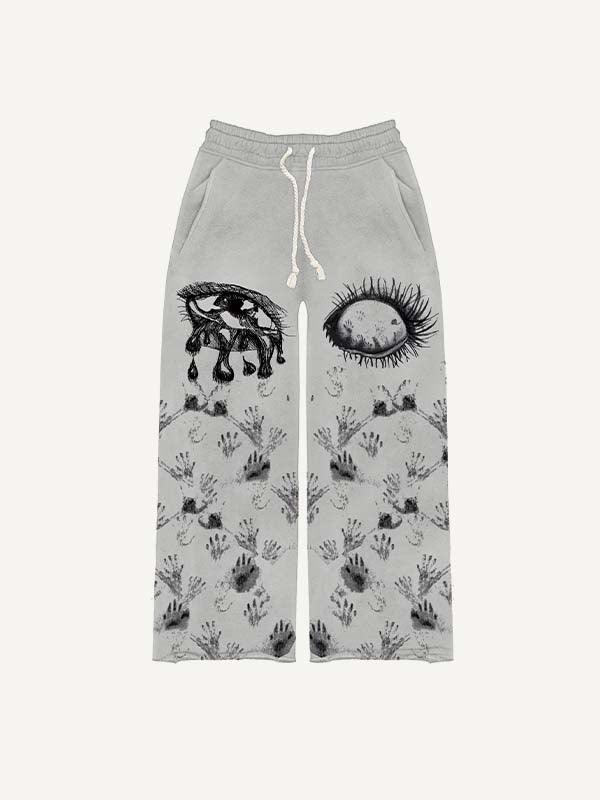 Pantalones con cintura elástica y estampado de ojos, palmas y lágrimas 