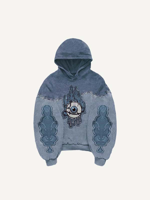 Sudadera con capucha y bolsillos inclinados con estampado de calcomanías falsas de ojos en bloques de color 