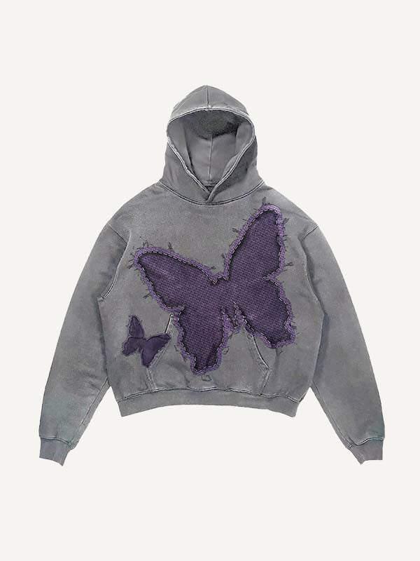 Sudadera con capucha y bolsillos inclinados con estampado de mariposas lavadas y desgastadas