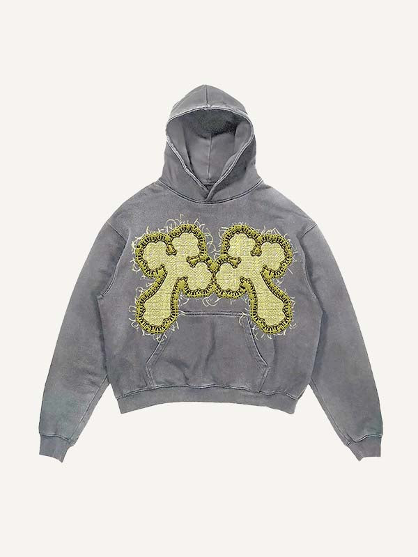 Sudadera con capucha y bolsillos inclinados con estampado de cruz y calavera lavada y desgastada