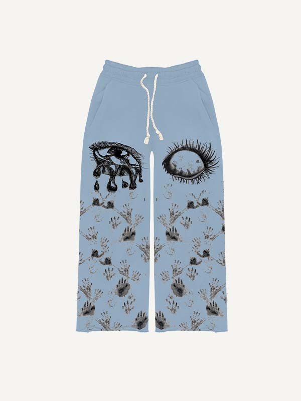 Pantalones con cintura elástica y estampado de ojos, palmas y lágrimas 