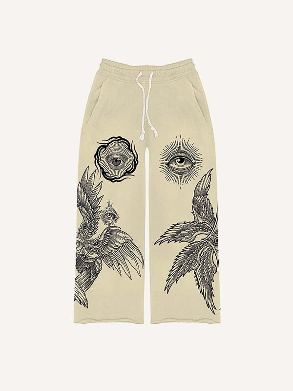 Pantalones con cintura elástica y estampado de ojos, alas y sol