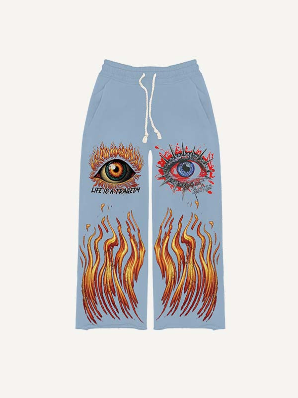 Pantalones con cintura elástica y estampado gráfico de ojos 