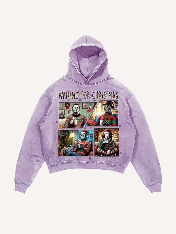Sudadera con capucha y bolsillos inclinados con estampado de terror navideño desgastado y lavado