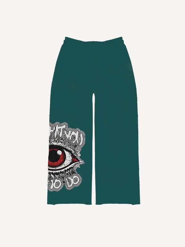 Pantalones con cintura elástica y estampado de calcomanías falsas con figuras, ojos y letras