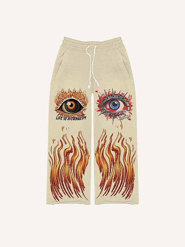Pantalones con cintura elástica y estampado gráfico de ojos 