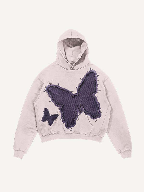 Sudadera con capucha y bolsillos inclinados con estampado de mariposas lavadas y desgastadas