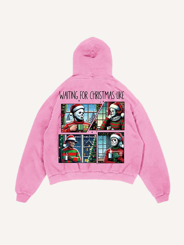 Sudadera con capucha y bolsillos inclinados con estampado de terror navideño desgastado y lavado