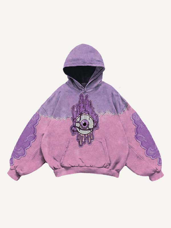 Sudadera con capucha y bolsillos inclinados con estampado de calcomanías falsas de ojos en bloques de color 