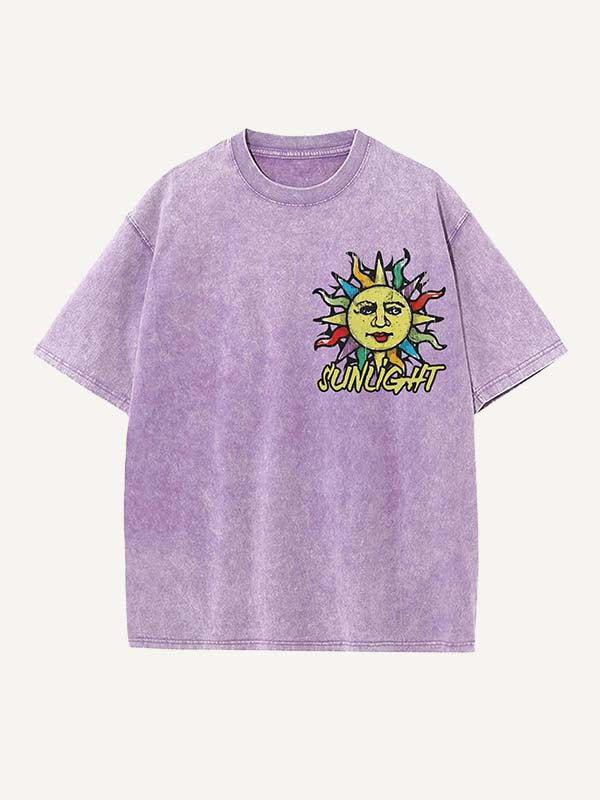 Camiseta de cuello redondo con estampado de letras y sol desgastado y lavado 
