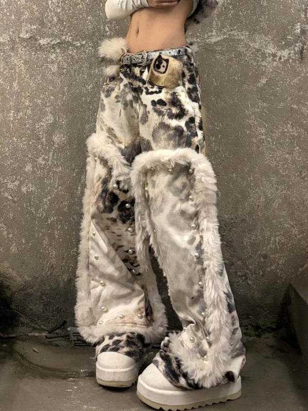 Vaqueros desgastados con estampado de leopardo y patchwork de polar lavado 