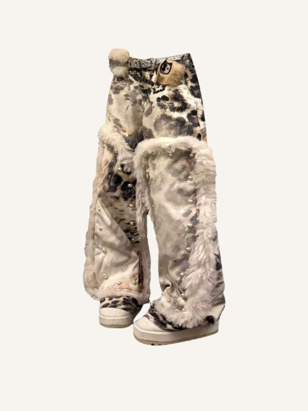 Vaqueros desgastados con estampado de leopardo y patchwork de polar lavado 