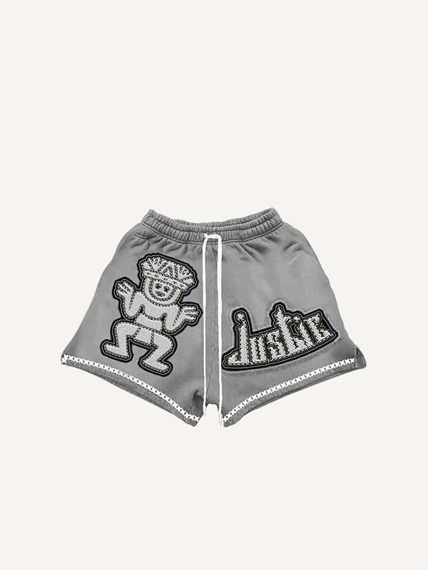 Pantalones cortos con cintura con cordón y estampado de calcomanías falsas de figuras y letras