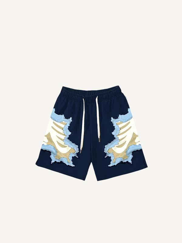 Pantalones cortos con cintura con cordón y estampado de esqueleto con calcomanías falsas en bloques de color 